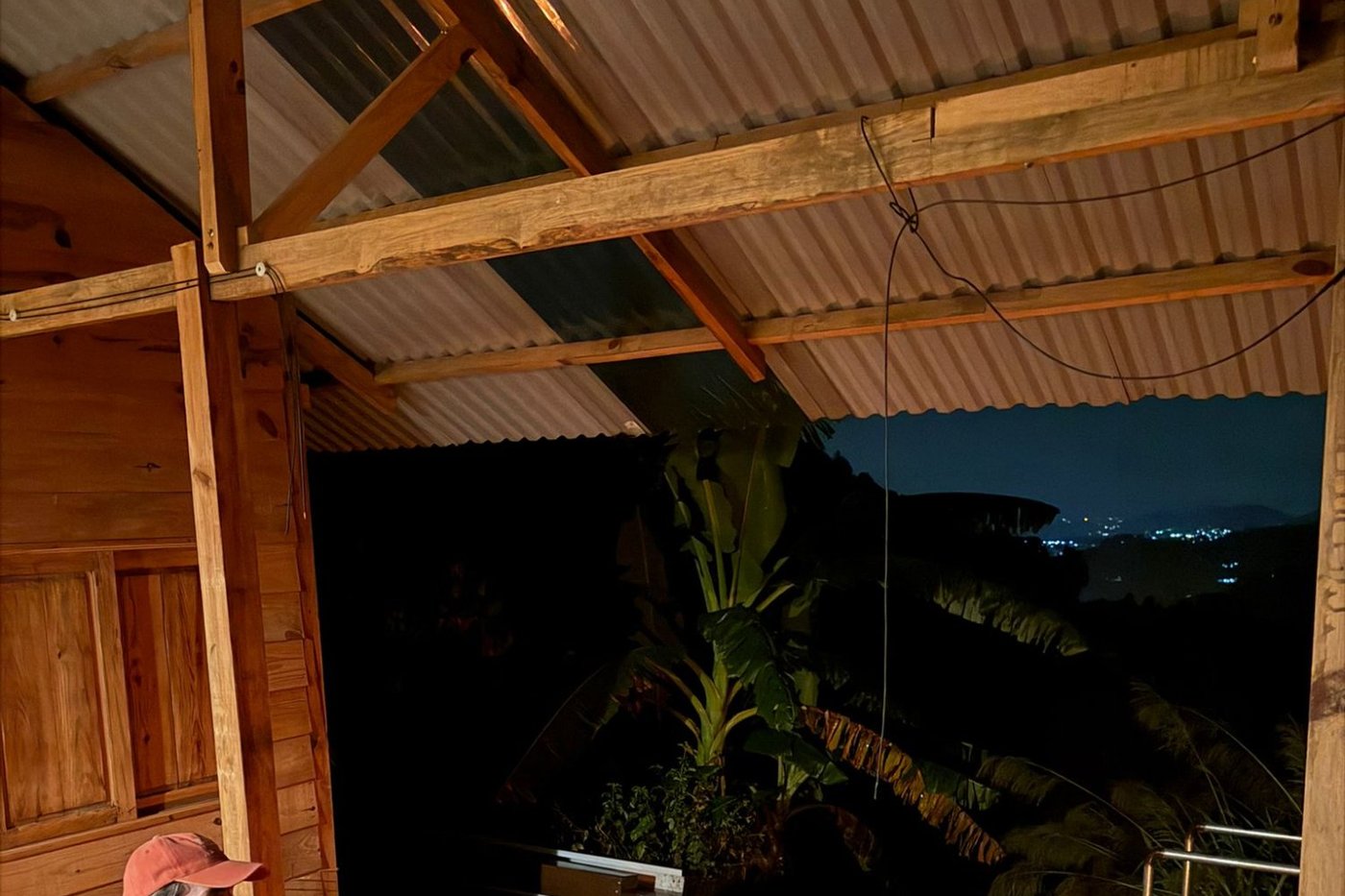 Guitar by the fire with city lights below